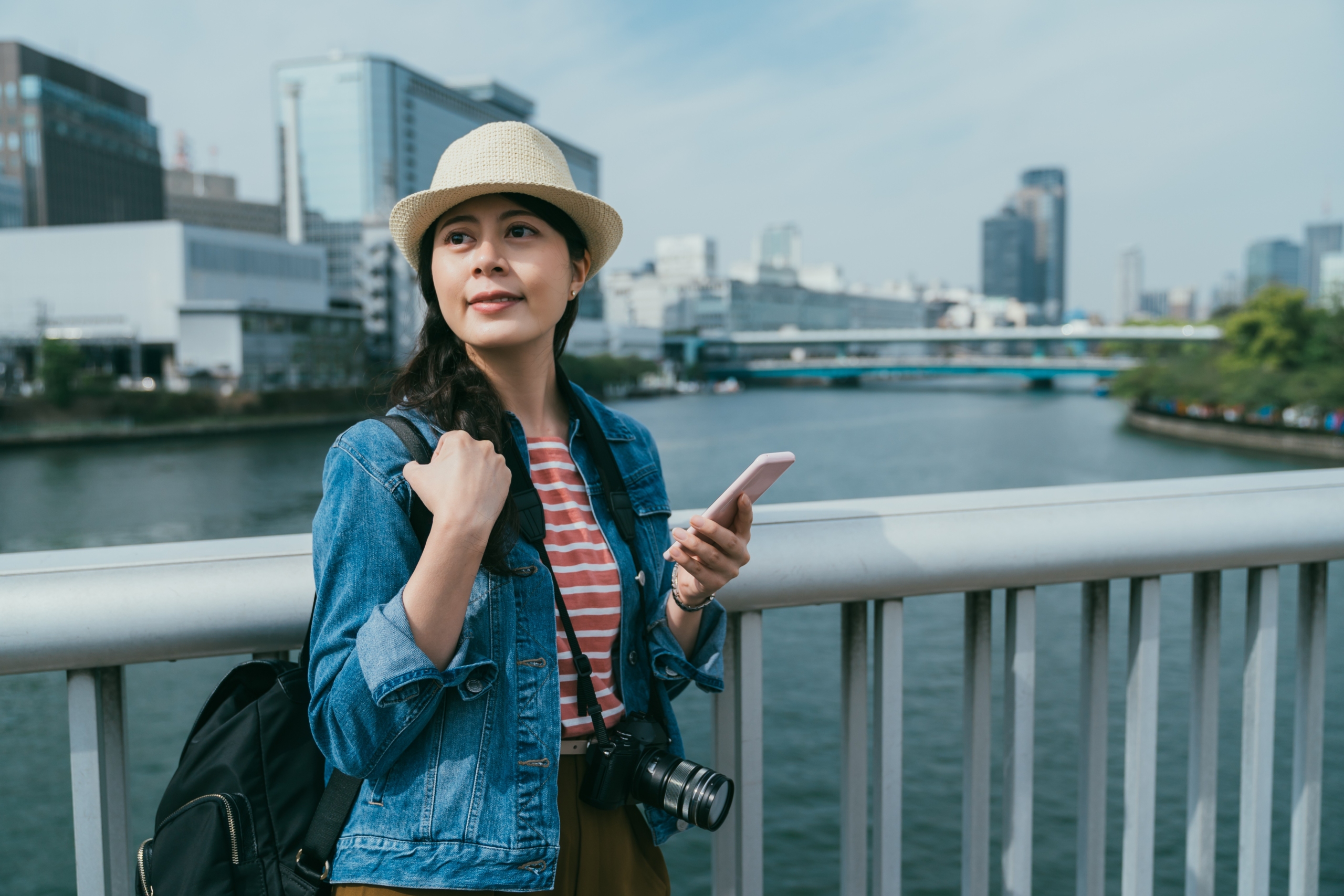 girl looking beautiful cityscape in Osaka japan