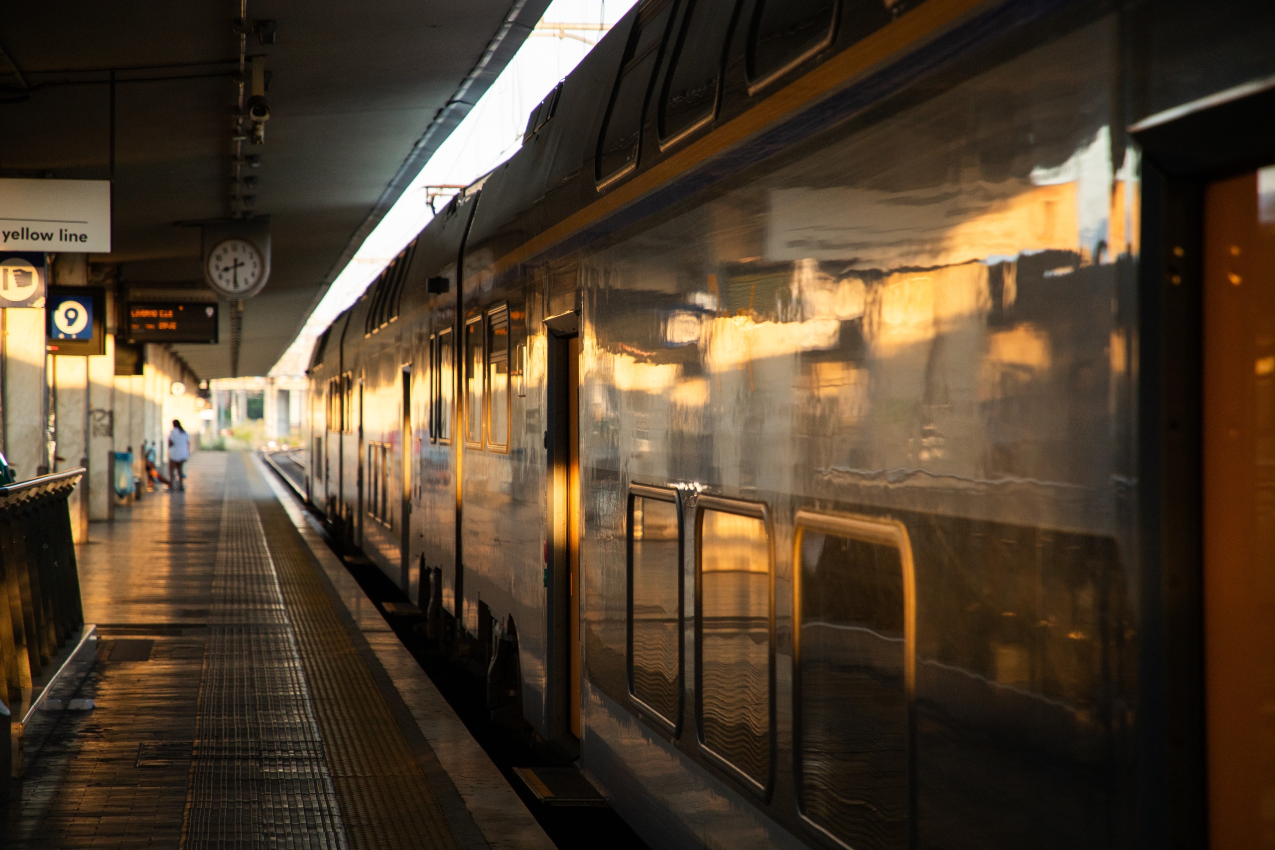 trains in train station in golden sunset light