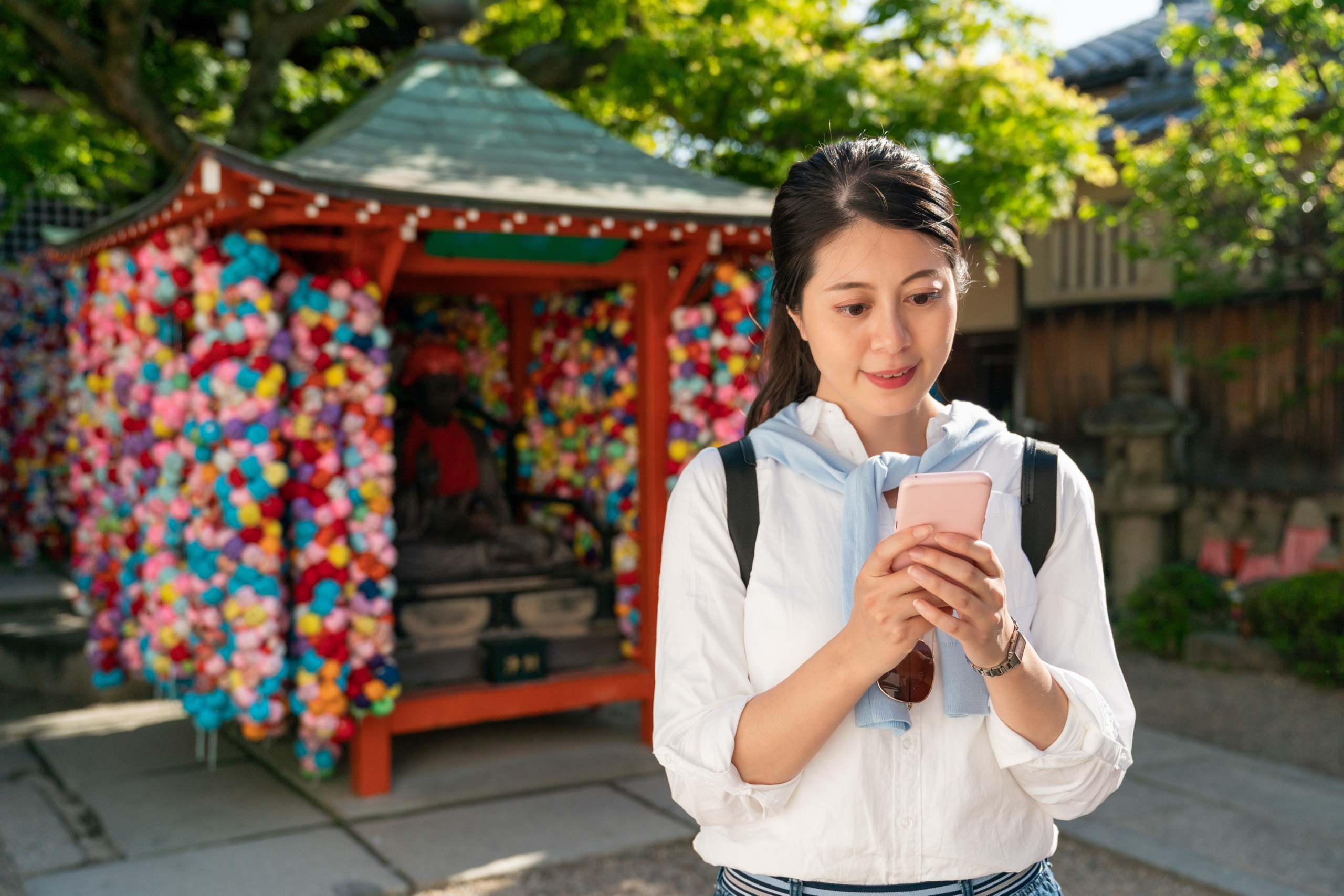 woman checking in with Kukurizaru at kongoji