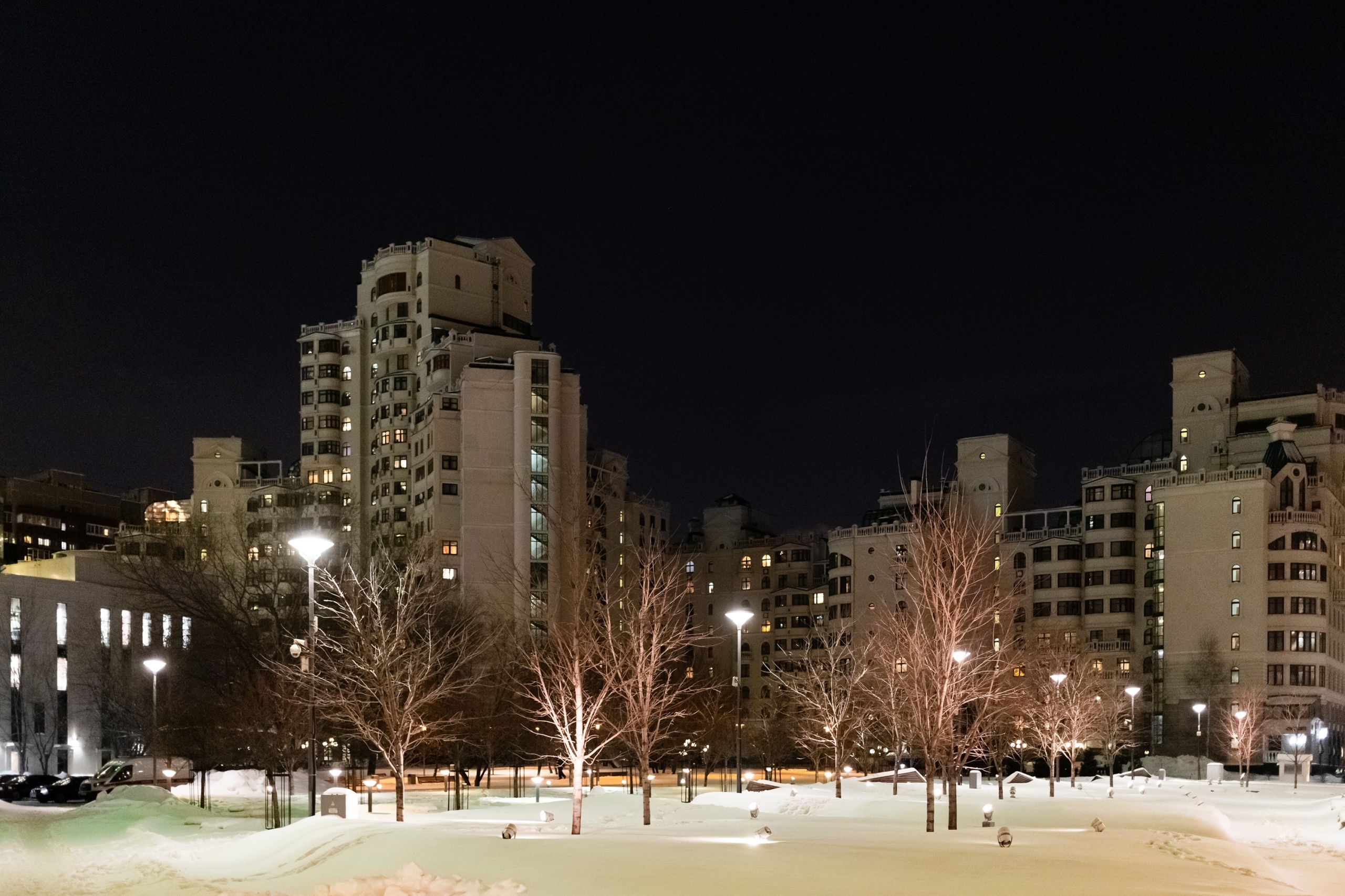 snow-covered square in Moscow city at winter night